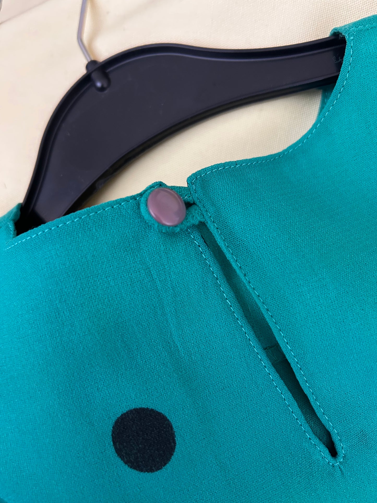 Polka dot sleeveless blouse