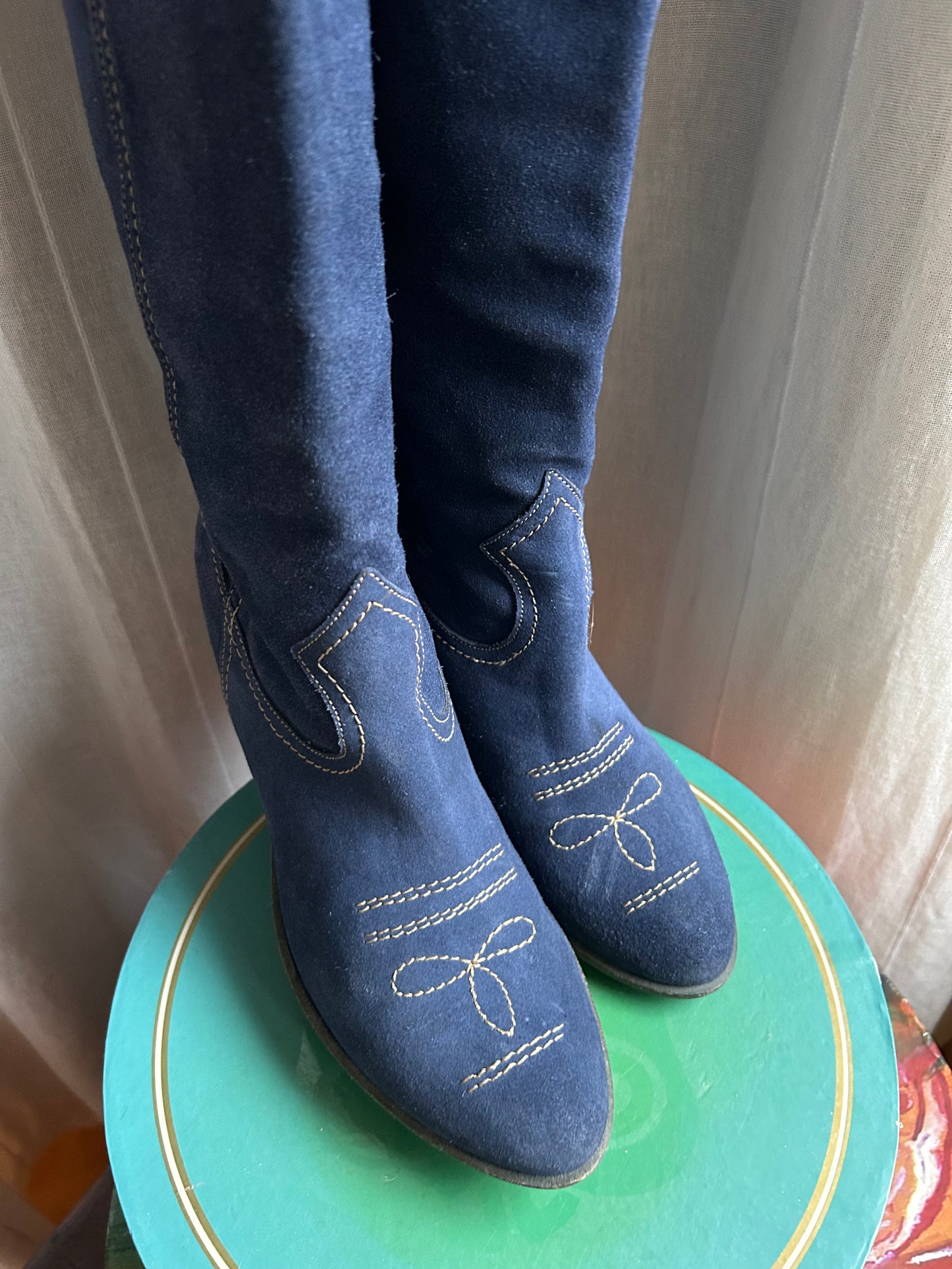 Blue suede cowboy boots