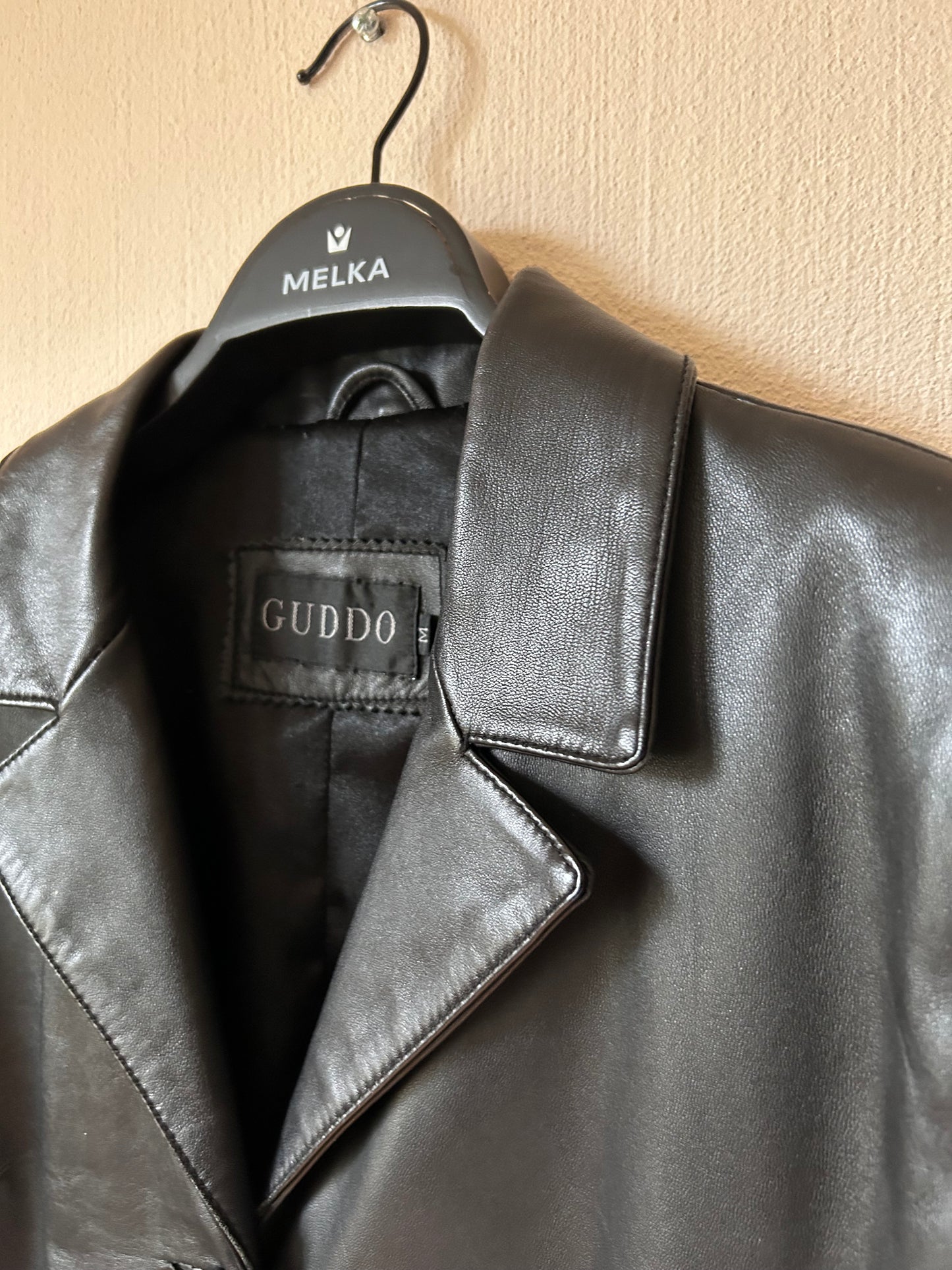 Vintage black leather coat