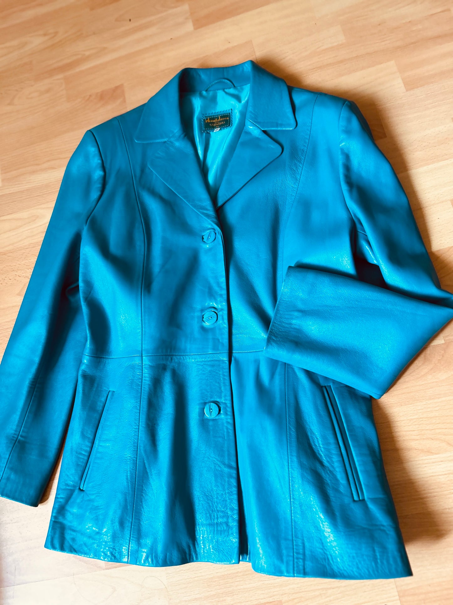 Turquoise leather jacket (XL)