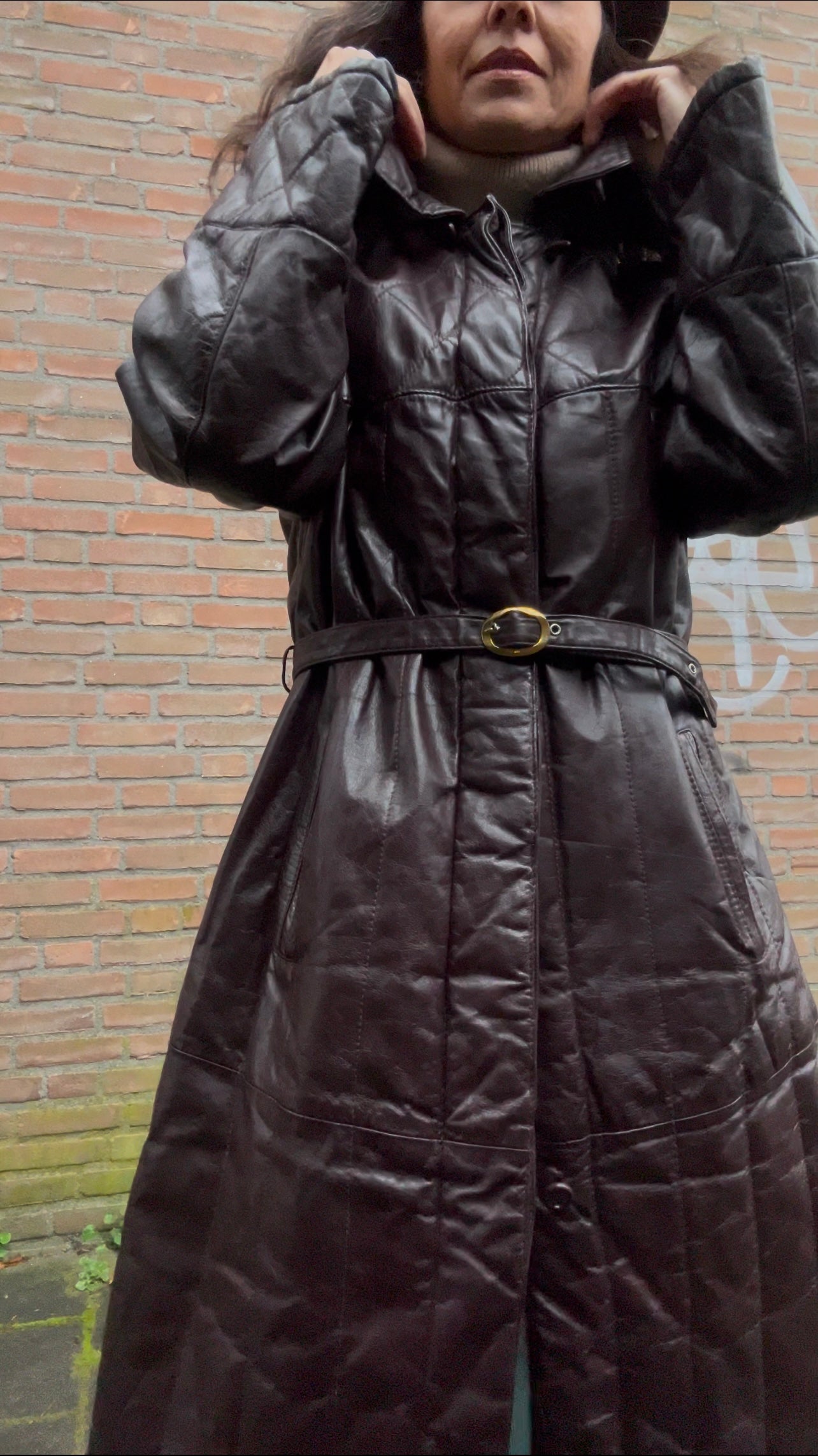 Leather trench coat with padded lining