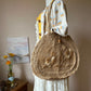 Flower embroidered straw bag