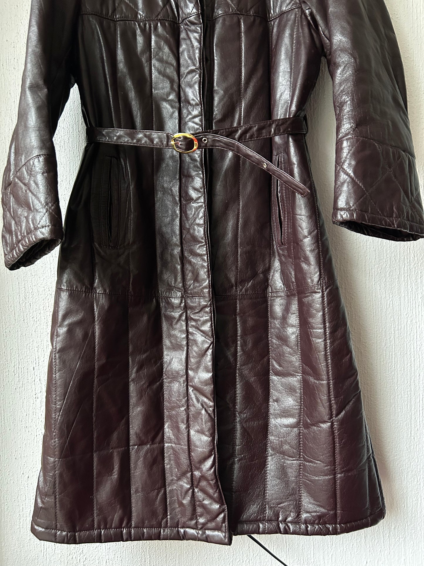 Leather trench coat with padded lining