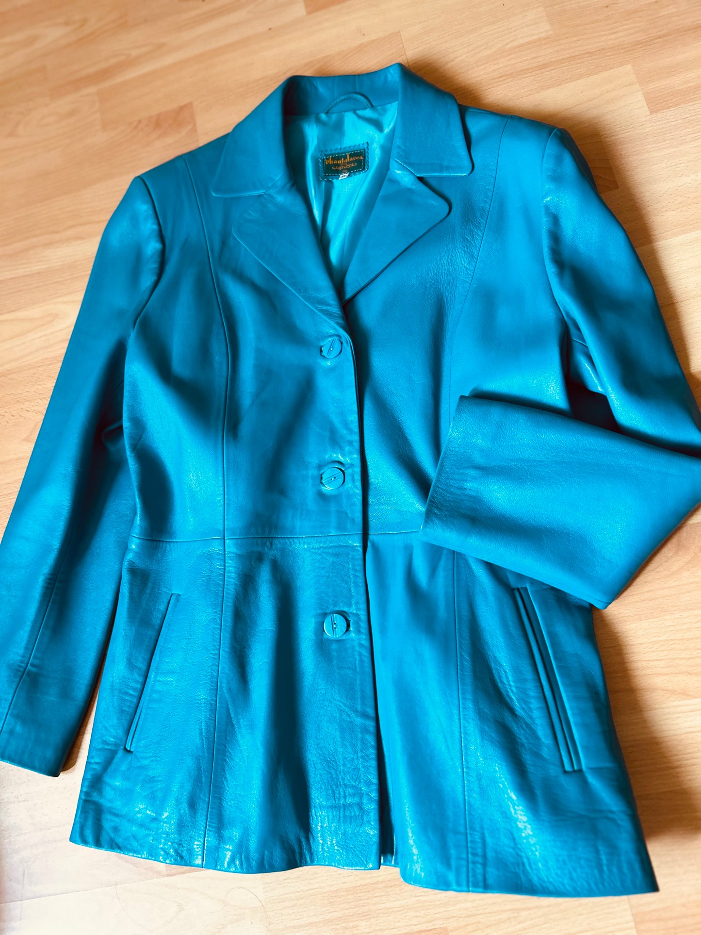 Turquoise leather jacket (XL)