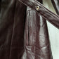 Leather trench coat with padded lining