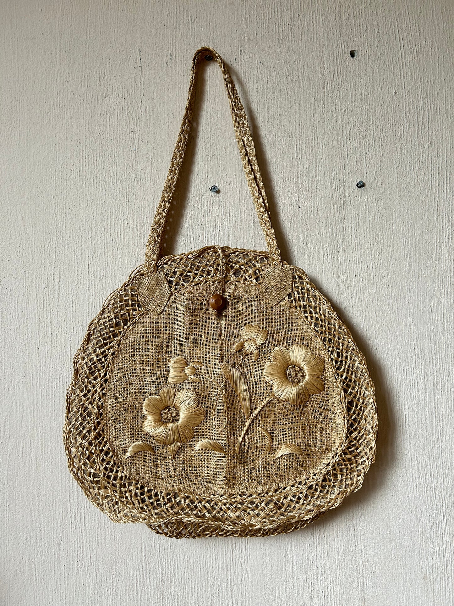 Flower embroidered straw bag