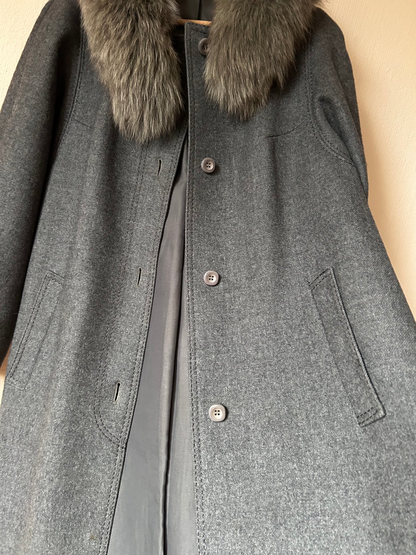 Wool coat with faux fur collar