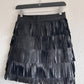 Caroll lamb leather fringe skirt