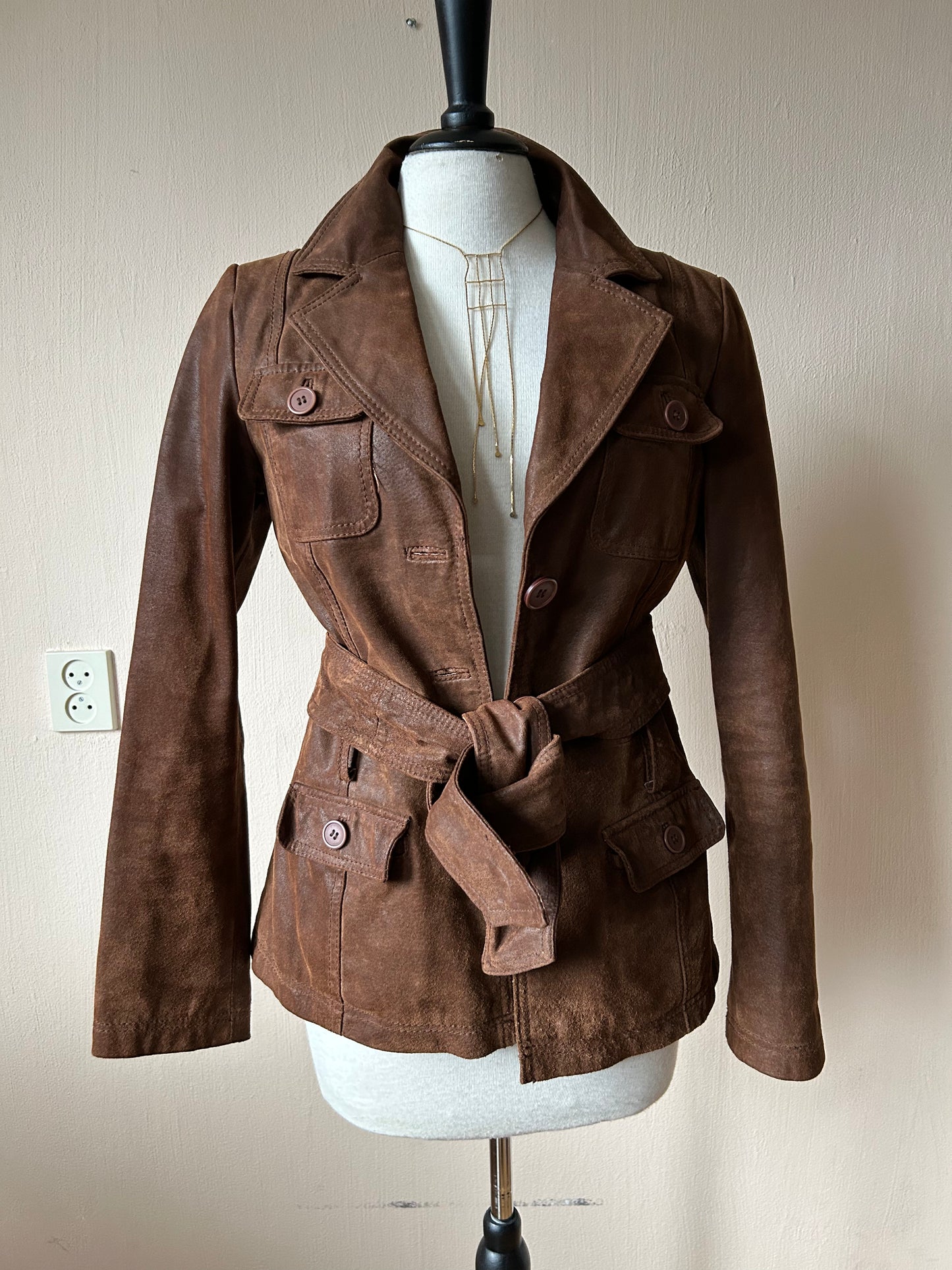 Belted leather jacket