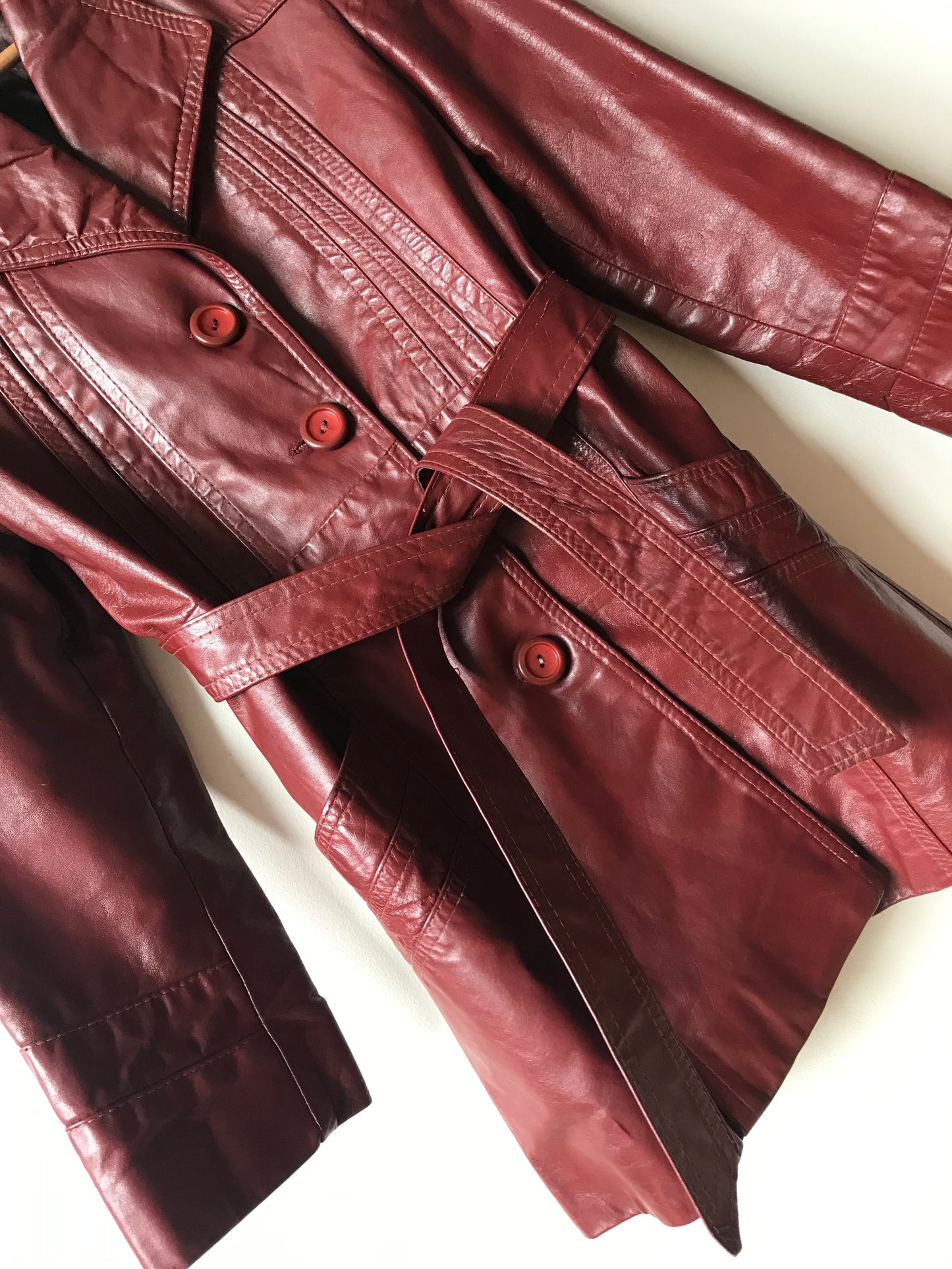 Bordeaux leather trench coat