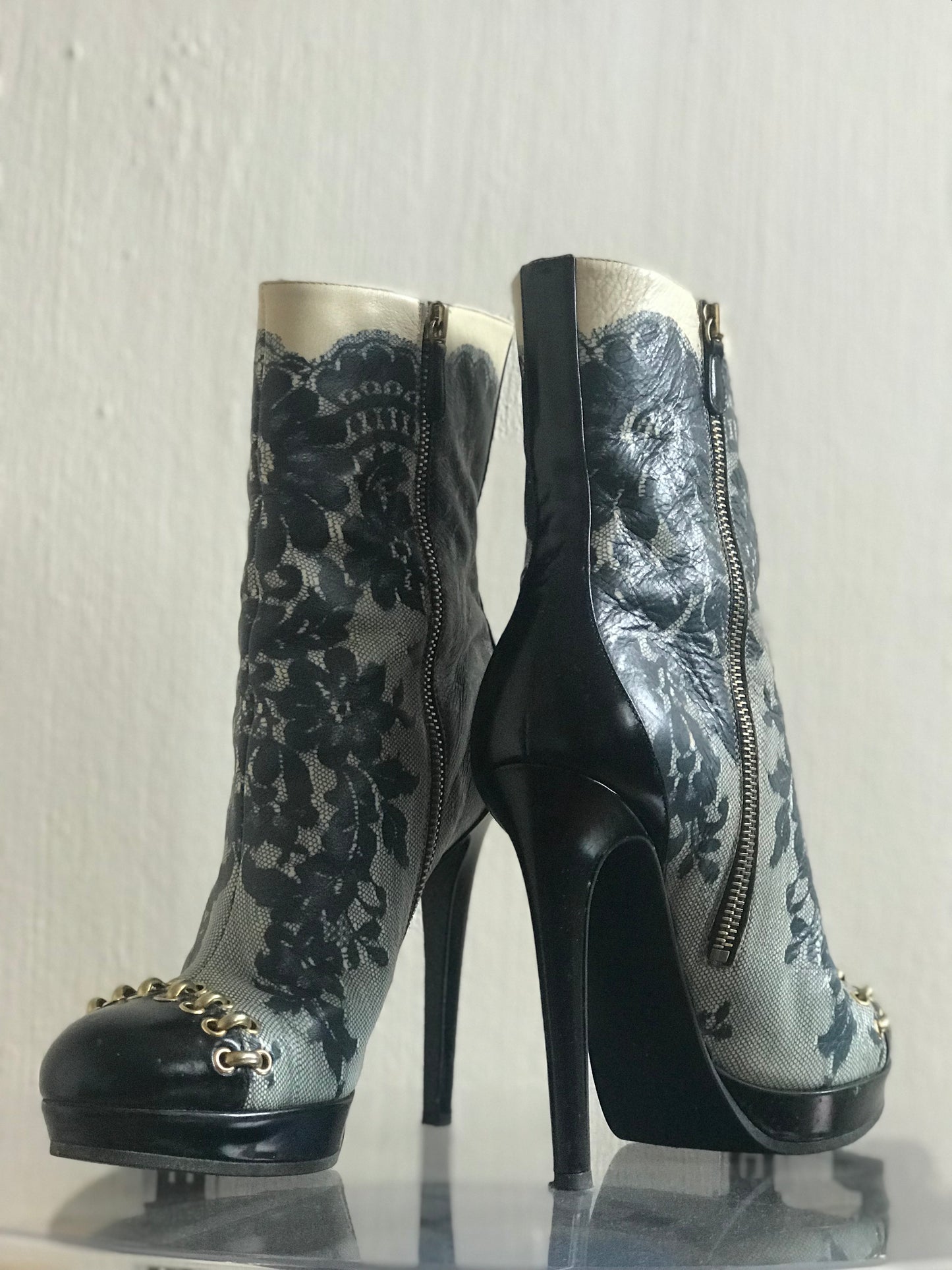 Moschino lace print boots