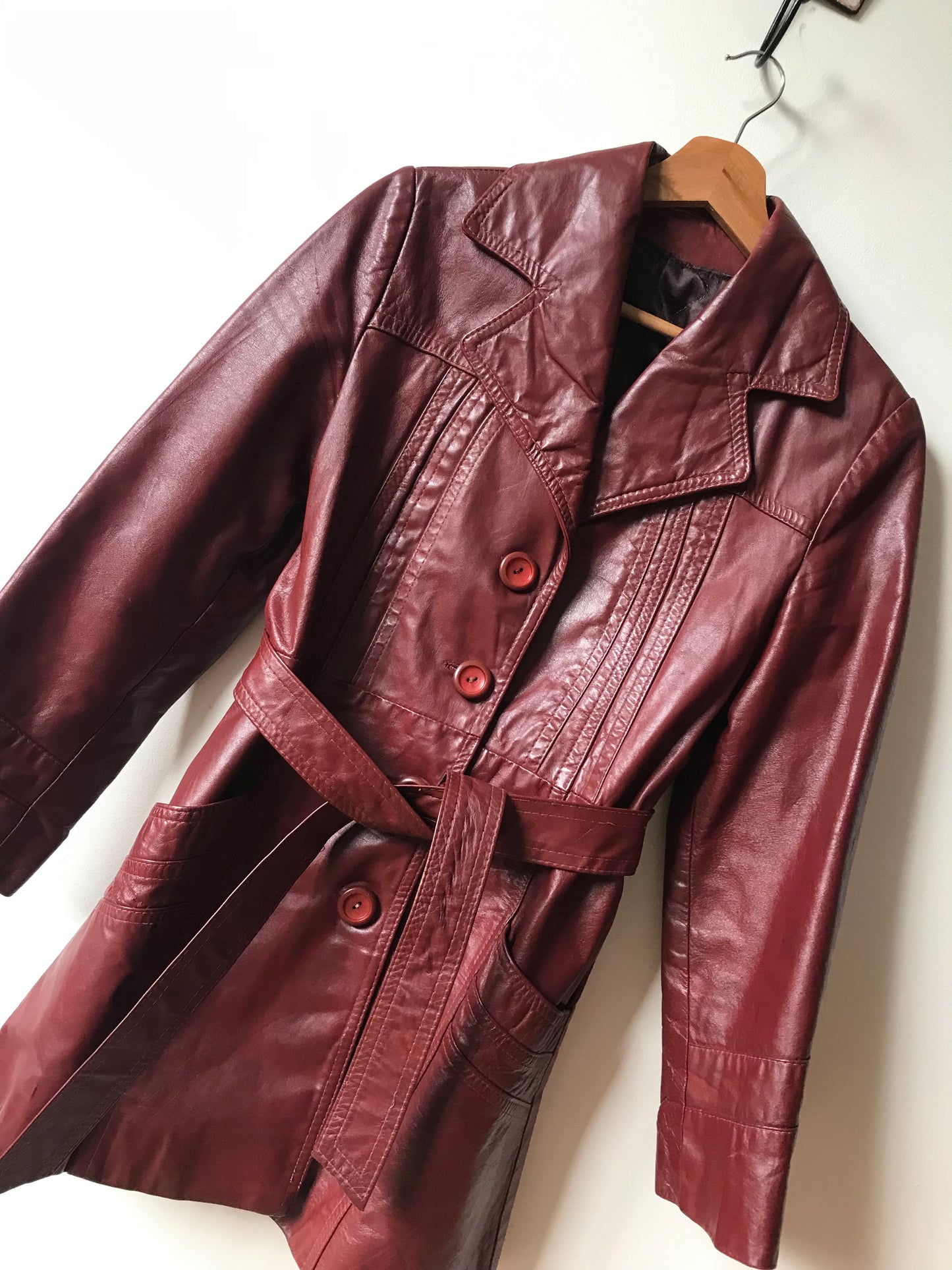 Bordeaux leather trench coat